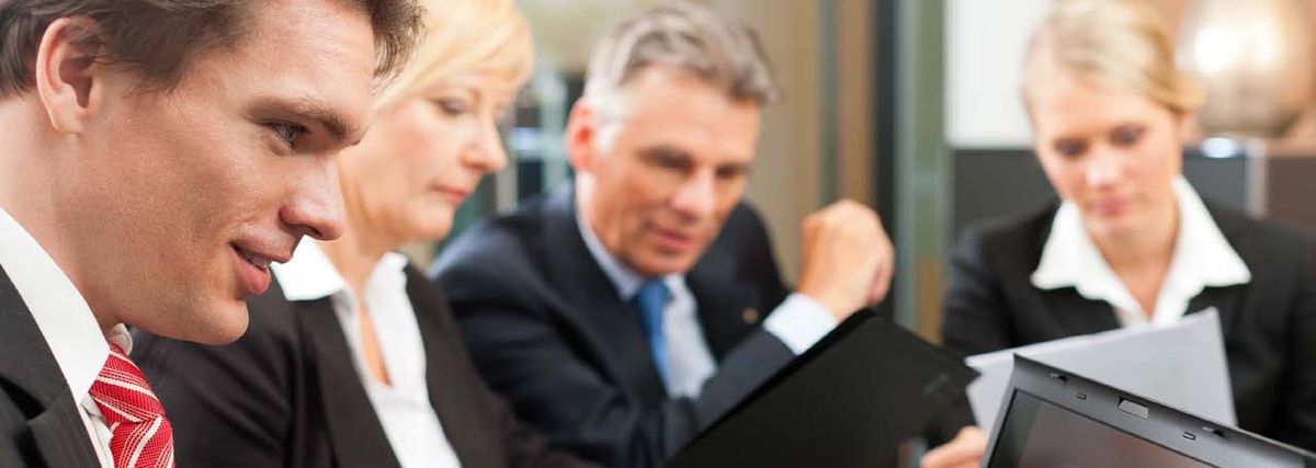 Two people reviewing security plans together