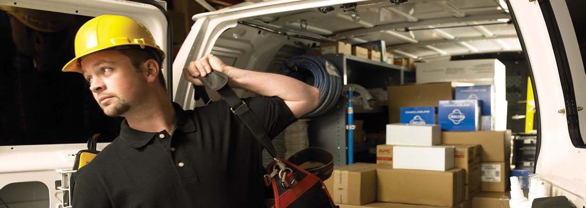 A Setronics technician at a fully stocked service vehicle